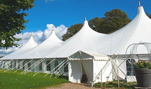 a line of sleek and modern portable restrooms ready for use at an upscale corporate event in Oxford, MD